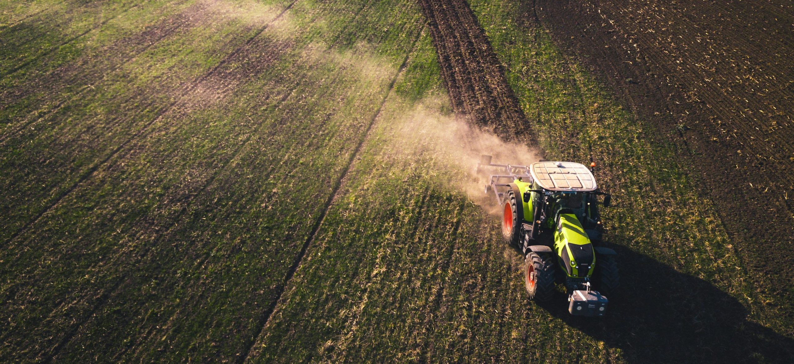 tractor harvesting unsplash – Copy